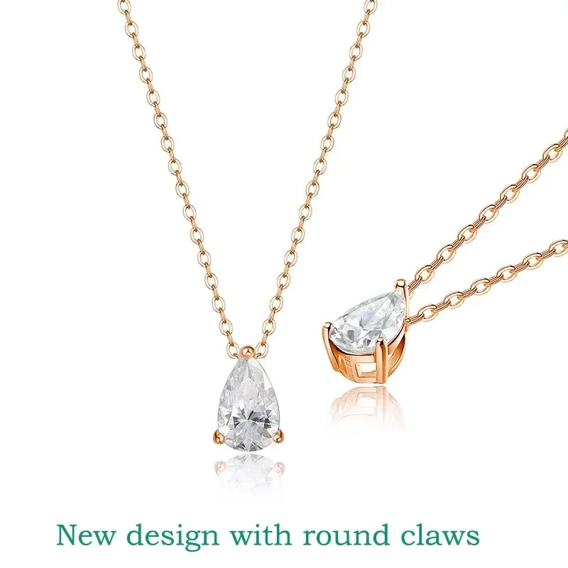 Rose gold necklace with teardrop-shaped clear gemstones on a white background
