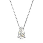 Pear-shaped diamond pendant on a chain against a white background
