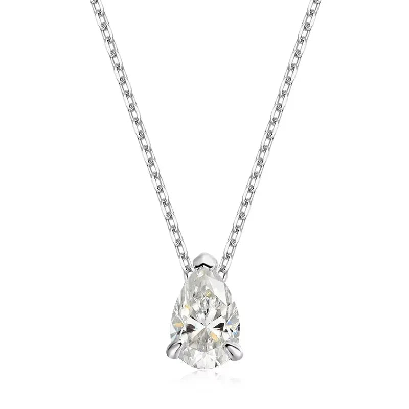 Pear-shaped diamond pendant on a chain against a white background
