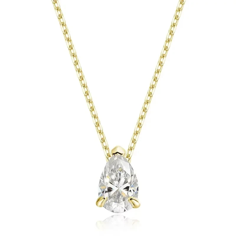 A pear-cut diamond pendant necklace in a yellow gold setting on a delicate gold chain, shown against a solid white background.