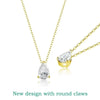 Gold necklaces with teardrop-shaped clear stones on a white background