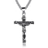 Silver crucifix pendant necklace on a white background
