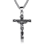 Silver crucifix pendant necklace on a white background
